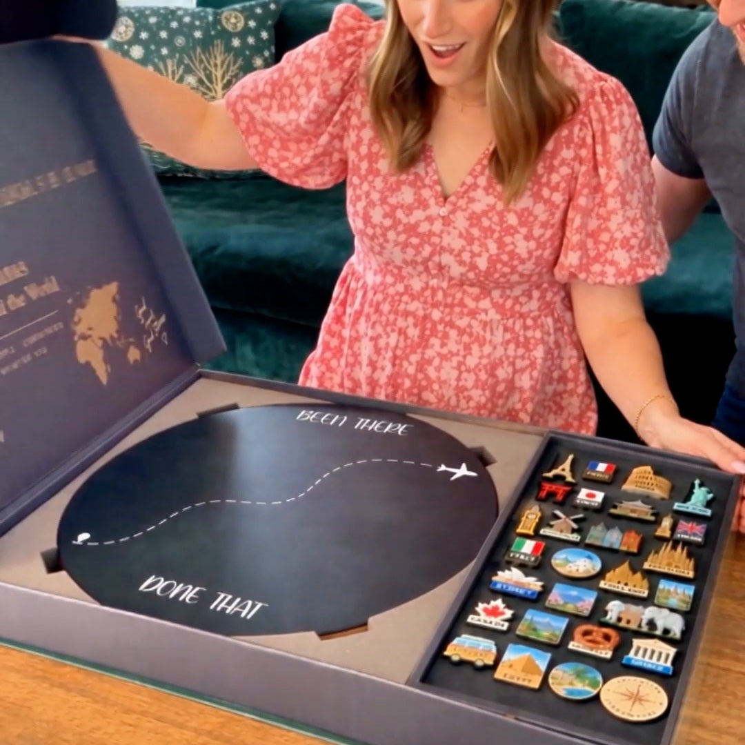 Travel magnet board shown inside open presentation packaging