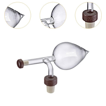 Glass wine aerator showing its chamber and bottle stopper components