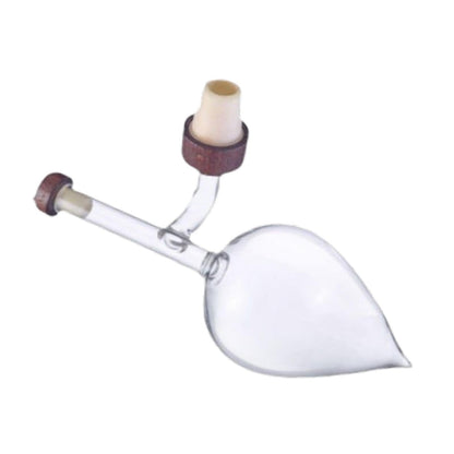 Minimal glass wine aerator designed for an elegant wine-serving ritual