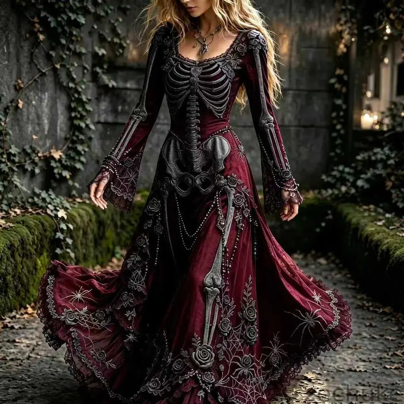 Red gothic maxi dress showing skeleton artwork, floral motifs and a long skirt
